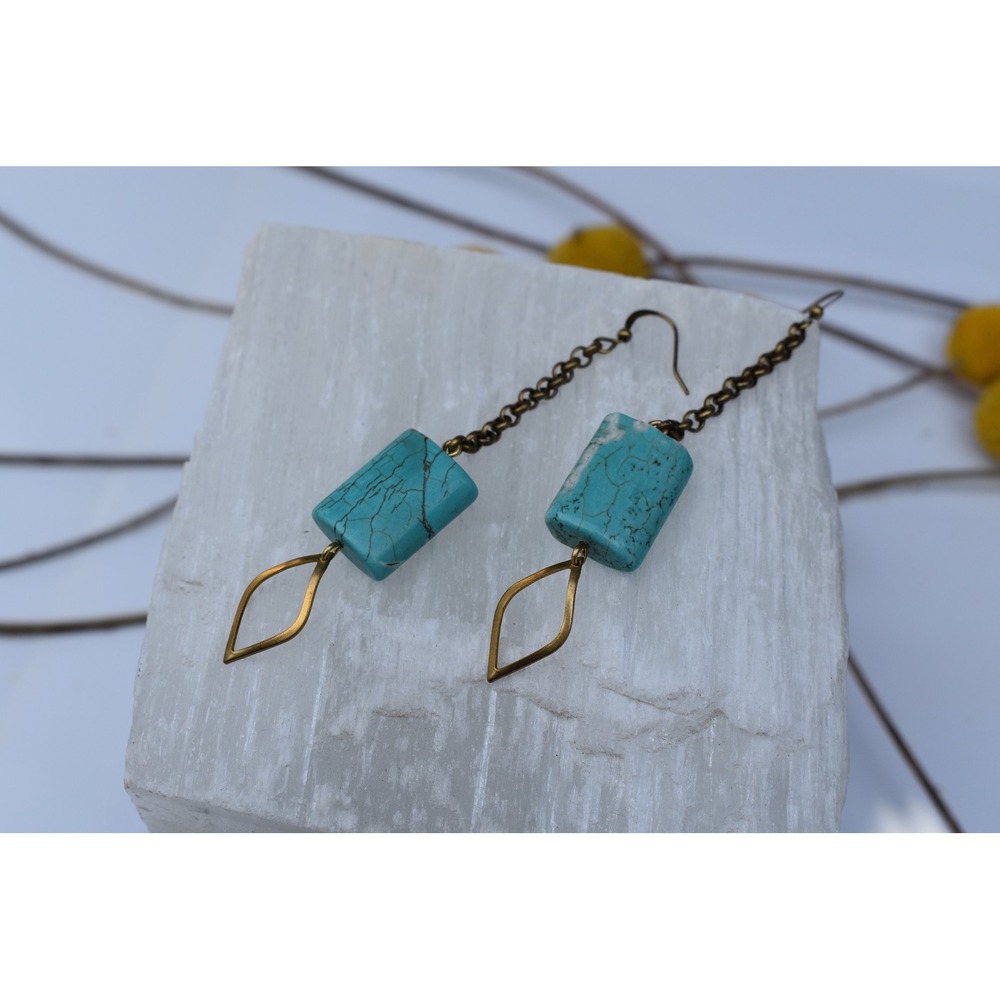 Teal colored howlite stone earrings with long brass chain